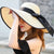 Women's Vacation Solid Color Bowknot Big Eaves Straw Hat