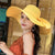 Women's Vacation Solid Color Bowknot Big Eaves Straw Hat