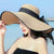 Women's Vacation Solid Color Bowknot Big Eaves Straw Hat